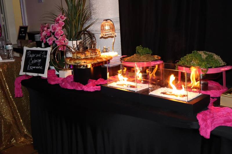 Birthday Catering Display Flavor and Flair Catering birthday event setup with tabletop fire pits and slider display