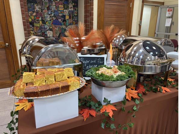 Holiday Outdoor Catering Flavor and Flair Catering holiday catering outdoor spread with chafing dishes and seasonal decor